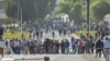 Demonstrators block the San Isidro bridge at the entrance to Arequipa, Peru, during protests to call for the resignation of President Dina Boluarte, on Jan. 19, 2023.