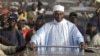 Opponents said Senegalese President Abdoulaye Wade 's decision to run for another term violated the constitution. Voters failed to renew his mandate in 2012. 