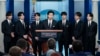 FILE - RM, center, accompanied by other K-pop supergroup BTS members from left, V, Jungkook, Jimin, Jin, J-Hope, and Suga speaks during the daily briefing at the White House in Washington, May 31, 2022. 