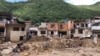 Una docena de viviendas del sector 23 de Enero se desplomaron esta semana por deslizamientos de tierra ocurridas por las fuertes lluvias en Caracas, Venezuela. ÁLVARO ALGARRA/VOA