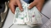Ruble's Problems Spread to Other Ex-Soviet Currencies