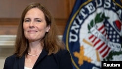 La juge Amy Coney Barrett, candidate du président Donald Trump, à Capitol Hill, à Washington, DC, le 21 octobre 2020. Leigh Vogel/Pool via REUTERS