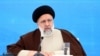 TOPSHOT - A handout picture provided by the Iranian presidency shows Iran's President Ebrahim Raisi during a meeting with his Azeri counterpart at the site of Qiz Qalasi, the third dam jointly built by Iran and Azerbaijan on the Aras River, ahead of its i