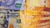 Le Zimbabwe va imprimer des billets indexés sur le cours du dollar américain