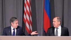 U.S. Secretary of State Antony Blinken, left, and Russian Foreign Minister Sergey Lavrov meet on the sidelines of the Organization for Security and Cooperation in Europe conference in Stockholm, Sweden, Dec. 2, 2021.