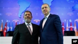 نخست وزیر ترکیه در دیدار با مرسی در سپتامبر گذشته 