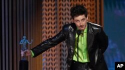 Timothee Chalamet accepts the award for outstanding performance by a male actor in a leading role for "A Complete Unknown" during the 31st annual Screen Actors Guild Awards on Feb. 23, 2025, at the Shrine Auditorium in Los Angeles.