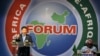FILE - Chinese President Xi Jinping, left, delivers his speech during the opening ceremony of the Johannesburg Summit for the Forum on China-Africa Cooperation at the Sandton Convention Centre in Johannesburg, Dec. 4, 2015. 