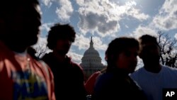 Para pendukung imigrasi berkumpul untuk unjuk rasa di Capitol Hill, Washington, 23 Januari 2018.
