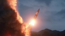 FILE - North Korea test fires a new weapon, in this undated photo released Aug. 11, 2019, by North Korea's Korean Central News Agency (KCNA).