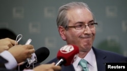 FILE - President of Brazil's Chamber of Deputies Eduardo Cunha speaks during a news conference at the Chamber of Deputies in Brasilia, Brazil, Dec. 7, 2015. 