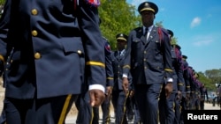 Manb Polis Nasyoal Ayiti a PNH. Foto: REUTERS/Swoan Parker (Pòtopresn. Ayiti)