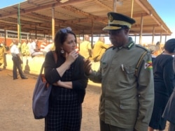 Shannon Hader, the deputy executive director of UNAIDS, talks to senior Zimbabwe Prisons Services at Chikurubi Maximum Security Prison in Harare, Zimbabwe, June 13, 2019.