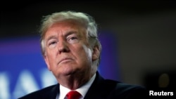 El presidente de Estados Unidos, Donald Trump, durante un mitin de campaña en Erie, Pensilvania, el 10 de octubre de 2018. 