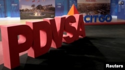 Los logotipos corporativos de la compañía petrolera estatal PDVSA y Citgo Petroleum Corp se ven en Caracas, Venezuela. Foto de archivo.