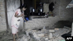 Une habitante du village de Tobadak, dans le centre de Mamuju, dans la province de Sulawesi, dans l’ouest de l'Indonésie, le 28 septembre 2018.