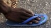 Polio returns to Cameroon where health officials renew vaccination efforts. Polio cripples young African (above) for life in countries like Ivory Coast.