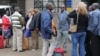 FILE - Aid workers from various NGOs active in South Sudan arrive at Wilson airport in Nairobi, Kenya, July 13, 2016, from Juba.