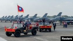 FILE - Taiwan President Tsai Ing-wen oversees the commission of the first squadron of the upgraded F-16V fighters in Chiayi Air Force Base, Taiwan in this handout picture provided by Taiwan Presidential Office on November 18, 2021. (Taiwan Presidential Office/Handout via REUTERS)