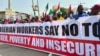 FILE - Nigerians protest against high cost of living and massive suffering following a hike in fuel prices and devaluation of the naira, in Abuja, Nigeria, Feb. 27, 2024. The government has taken some steps to alleviate the situation, but more protests are planned for August.