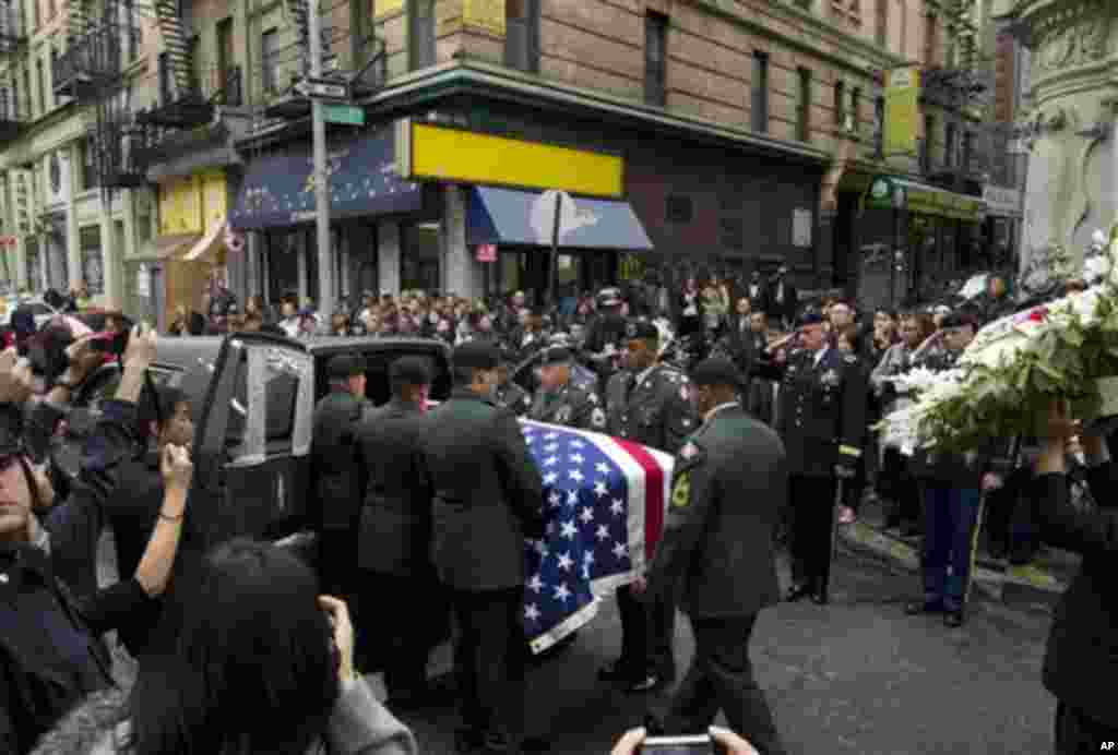 Pvt. Danny Chen's casket is carried into a hearse by soldiers during his funeral procession on Thursday, Oct. 13, 2011 in New York. (AP Photo/Jin Lee)