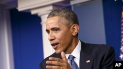 Pour Barack Obama, le piratage était plutôt du cybervandalisme (AP)