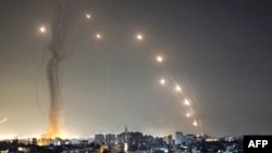 Makombora yakirushwa kuelekea Israel kutoka Gaza
May 11, 2021. (Photo by MAHMUD HAMS / AFP)
