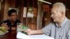 Thet Sambath, a journalist, with former Khmer Rouge leader Nuon Chea, file photo. 