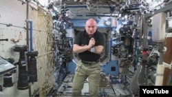 NASA Astronaut Scott Kelly completes the half way point of the 342-day mission on the International Space Station. He and Mikhail Kormienko are participating in many life science experiments during their spaceflight. 