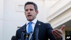 FILE - Rep. Adam Kinzinger, R-Ill., speaks to the media, at the White House in Washington.