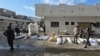 The bodies of victims lie in the courtyard of the Kamal Adwan hospital in Beit Lahya in the northern Gaza Strip, following a reported Israeli strike that hit the medical complex on Dec. 6, 2024.