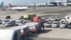 Plane Quarantined in NY After Passengers, Crew Fall Ill