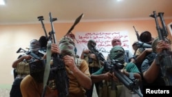Proses perekrutan pejuang ISIS di Haditha, barat laut Baghdad, Irak (25/8).