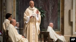 Cardinal Donald Wuerl, Archbishop of Washington, speaks before Mass at St. Mathews Cathedral, Aug. 15, 2018, in Washington. A Pennsylvania state grand jury report that was released on Tuesday, accused senior church officials, including Wuerl, of systematically covering up complaints. 