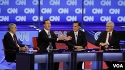 Ke-4 sisa kontestan calon presiden partai Republik, dari kiri: Ron Paul, Rick Santorum, Mitt Romney, dan Newt Gingrich, dalam perdebatan di Mesa, Arizona (22/2).