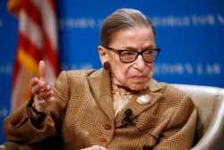 FILE - U.S. Supreme Court Associate Justice Ruth Bader Ginsburg speaks during a discussion on the 100th anniversary of the ratification of the 19th Amendment at Georgetown University Law Center in Washington, Feb. 10, 2020.