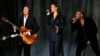 From left, Paul McCartney, Rihanna and Kanye West perform "FourFiveSeconds" at the 57th annual Grammy Awards in Los Angeles, California, Feb. 8, 2015. 