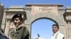 Yemeni security forces guard Bab al-Yemen entrance of Sana'a Old City, 6 Jan 2010