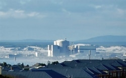 FILE - The Koeberg Nuclear Power Station, about 30 kilometers north of Cape Town, is owned and operated by South Africa's power utility Eksom, Jan. 18, 2007.