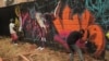 Graffiti artists perform at the annual Yoyo Tinz hip-hop festival in Ghana, held Oct. 9-13, 2019. (S.Knott/VOA) 