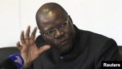 Zimbabwe's Finance Minister Tendai Biti addresses a news conference in Harare, Zimbabwe, Aug. 23, 2011.