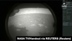 Perseverance Mars roverspacecraft berhasil mendarat di Mars, di Jet Propulsion Laboratory NASA di Pasadena, California, AS 18 Februari 2021. (Foto: NASA via Reuters)