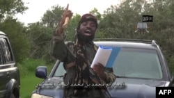 Boko Haram leader Abubakar Shekau delivering a speech at an undisclosed location, Aug. 24, 2014.