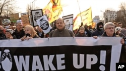 Climate activists attend the March for Climate in a protest against global warming in Katowice, Poland, Dec. 8, 2018, as the COP24 UN Climate Change Conference takes place in the city. 