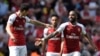 Le joueur d'Arsenal Alexandre Lacazette fête son but avec Granit Xhaka, à Londres, Angleterre, le 22 avril 2018.