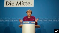 German Christian Democratic Party, CDU, chairwoman and Chancellor Angela Merkel addresses a news conference after a party's leaders meeting at the headquarters in Berlin, Germany, Oct. 29, 2018. 