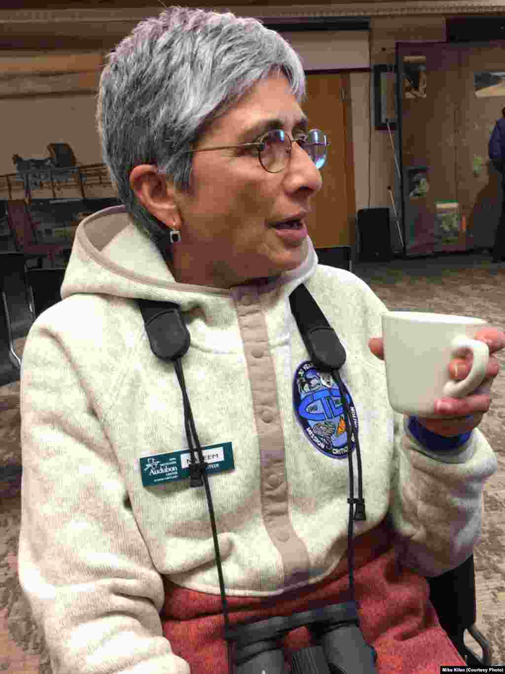 Neseem Munshi of Colorado has been coming to Nebraska to see the crane migration for many years and compares it to the world's other great migration in her native Africa -- the wildebeests.