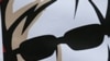 Police officer between images of blind Chinese activist Chen Guangcheng at protest, Hong Kong, May 4, 2012.
