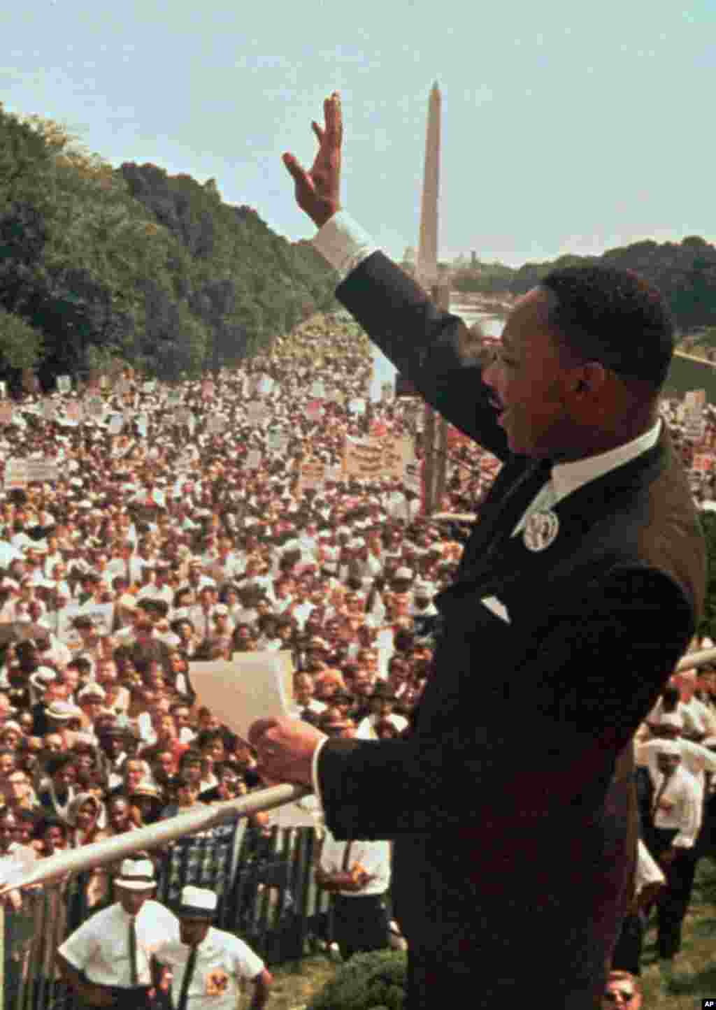 Dr. Martin Luther King Jr. acknowledges the crowd at the Lincoln Memorial for his "I Have a Dream" speech during the March on Washington, D.C. in this Aug. 28, 1963 file photo. 