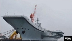 Tiongkok tengah memodernisasi militernya, termasuk membangun kapal induknya yang pertama (27/7).
